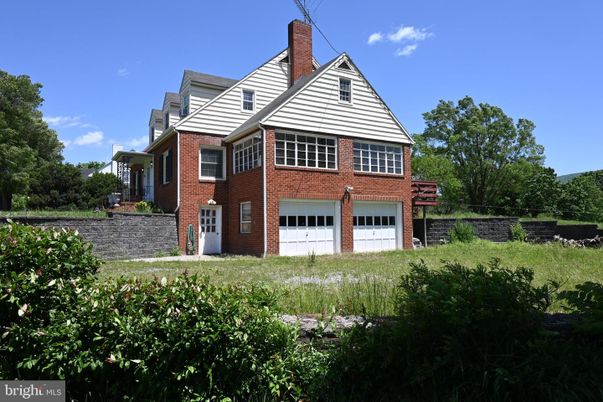 Attached, Exterior, Facade, Brick Facade, Brick Traditional