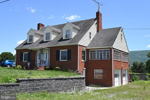 Attached, Exterior, Facade, Brick Facade, Cape Cod