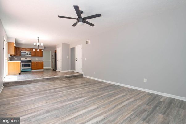 Chandelier, Empty room, Interior, Kitchen, Stainless Steel Appliances, Wood Texture Flooring