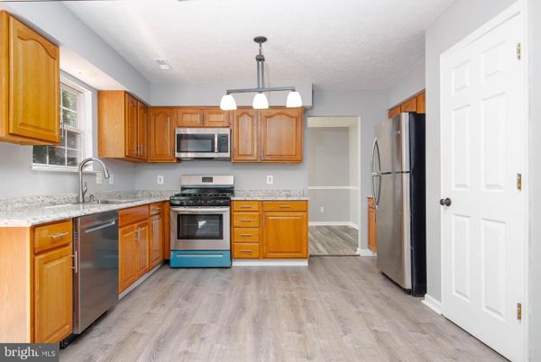 Interior, Kitchen, Pendant Lights, Stainless Steel Appliances, Wood Texture Flooring
