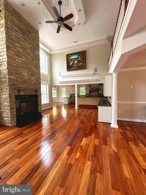 Fireplace, Interior, Recessed Lighting, Stone Walls, Wood Texture Flooring