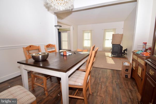 Chandelier, Dining room, Fireplace, Interior, Wood Texture Flooring