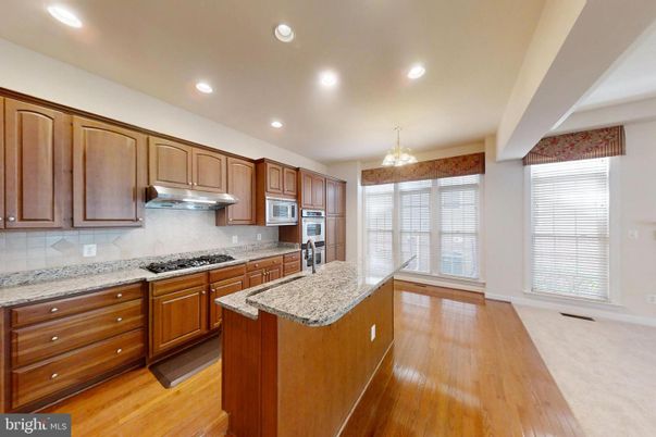 Chandelier, Interior, Kitchen, Recessed Lighting, Stainless Steel Appliances, Wood Texture Flooring