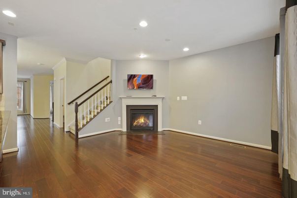 Empty room, Fireplace, Interior, Recessed Lighting, Wood Texture Flooring