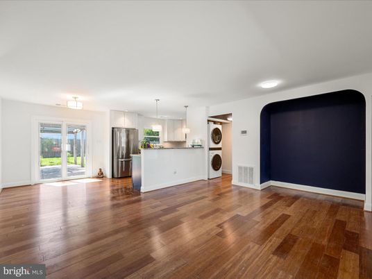 Empty room, Interior, Kitchen, Pendant Lights, Stainless Steel Appliances, Wood Texture Flooring