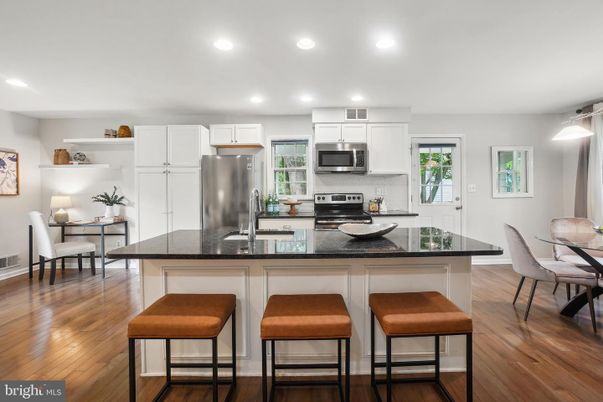 Dining room, Interior, Kitchen, Recessed Lighting, Stainless Steel Appliances, Wood Texture Flooring