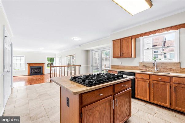 Fireplace, Interior, Kitchen, Recessed Lighting, Wood Texture Flooring