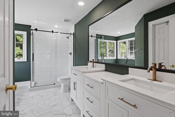 Bathroom, Dual Sink Vanities, Glass Shower, Interior, Marble, Recessed Lighting