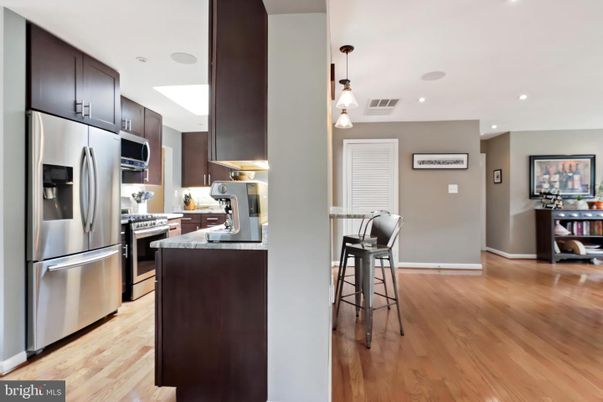 Interior, Kitchen, Pendant Lights, Recessed Lighting, Stainless Steel Appliances, Wood Texture Flooring