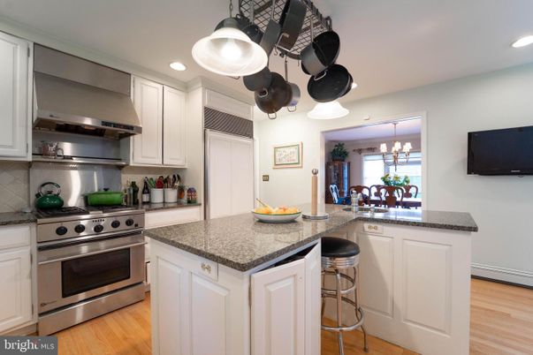 Chandelier, Interior, Kitchen, Recessed Lighting, Stainless Steel Appliances, Wood Texture Flooring