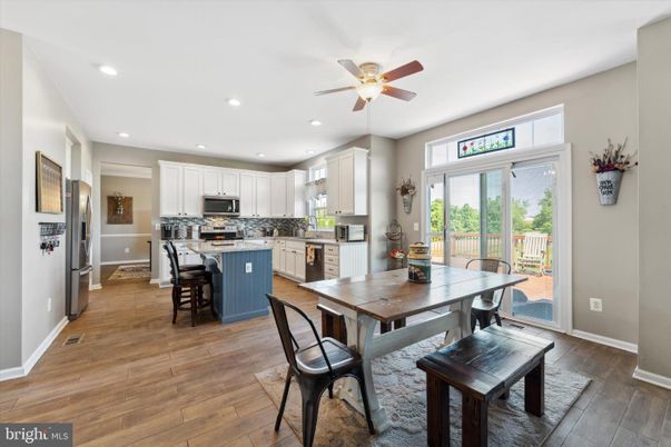 Dining room, Interior, Kitchen, Recessed Lighting, Stainless Steel Appliances, Wood Texture Flooring
