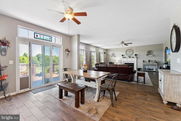 Dining room, Fireplace, Interior, Living room, Wood Texture Flooring