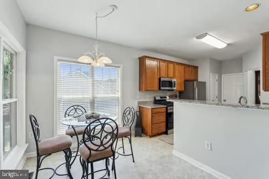 Chandelier, Dining room, Interior, Kitchen, Pendant Lights, Stainless Steel Appliances