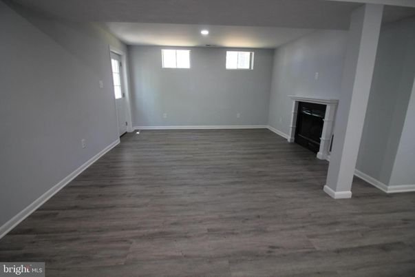 Empty room, Fireplace, Interior, Recessed Lighting, Wood Texture Flooring