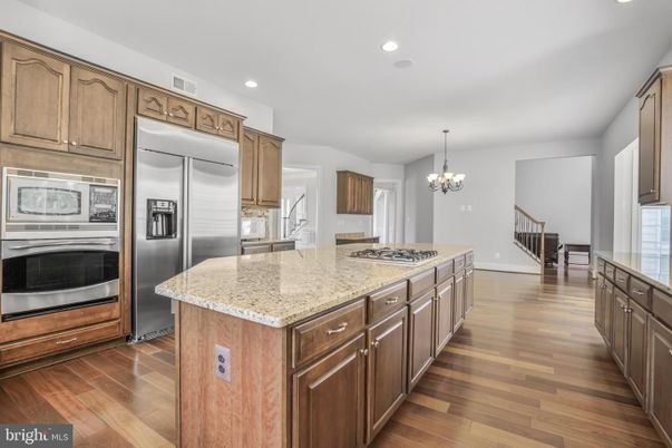 Chandelier, Interior, Kitchen, Recessed Lighting, Stainless Steel Appliances, Wood Texture Flooring