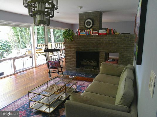 Chandelier, Fireplace, Interior, Living room, Stone Walls, Wood Texture Flooring