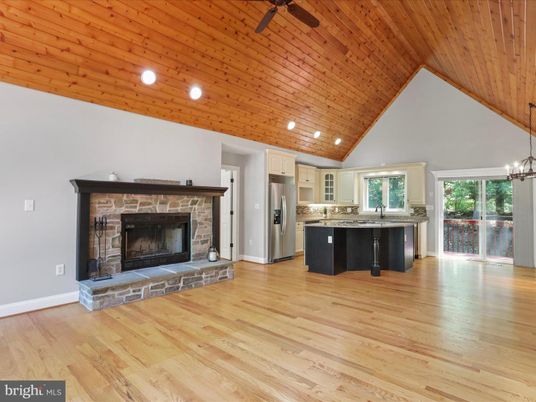 Chandelier, Empty room, Fireplace, Interior, Kitchen, Pendant Lights, Recessed Lighting, Wooden Ceilings, Wood Texture Flooring