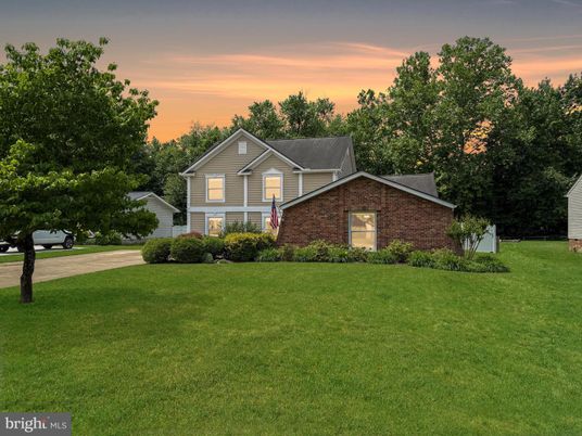Attached, Backyard, Exterior, Facade, Brick Facade, Brick Traditional