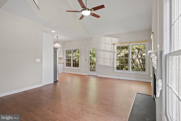 Chandelier, Empty room, Fireplace, Interior, Recessed Lighting, Wood Texture Flooring