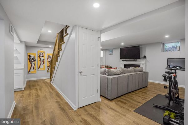 Fireplace, Fitness Equipment, Interior, Recessed Lighting, Wood Texture Flooring