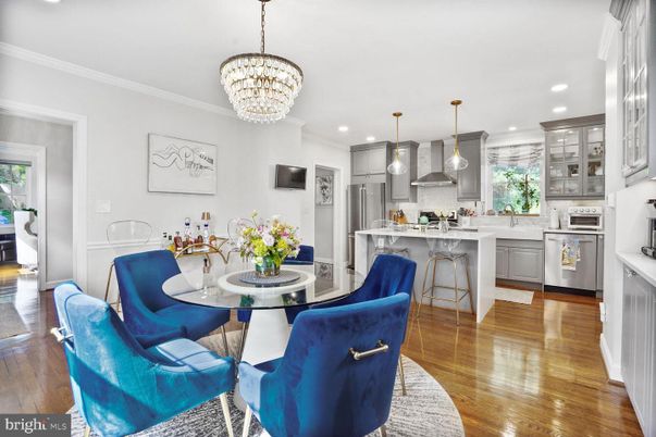 Chandelier, Dining room, Interior, Kitchen, Pendant Lights, Recessed Lighting, Stainless Steel Appliances, Wood Texture Flooring