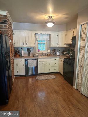 Interior, Kitchen, Stainless Steel Appliances, Stone Walls, Wood Texture Flooring