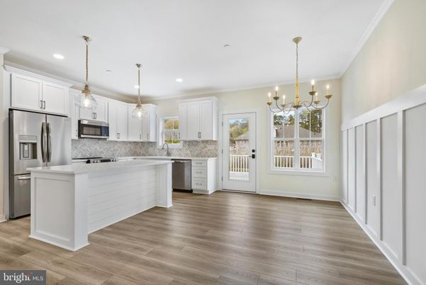 Chandelier, Interior, Kitchen, Pendant Lights, Recessed Lighting, Stainless Steel Appliances, Wood Texture Flooring