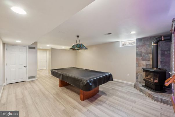 Billiard Table, Fireplace, Game Room, Interior, Pendant Lights, Recessed Lighting, Wood Texture Flooring