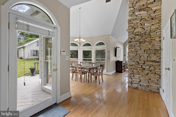 Chandelier, Dining room, Interior, Pendant Lights, Stone Walls, Wood Texture Flooring