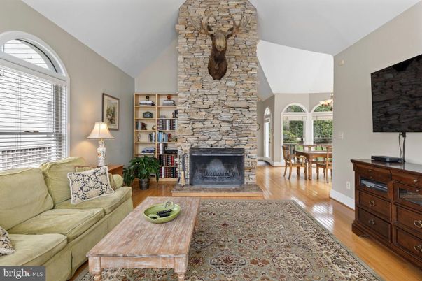 Dining room, Fireplace, Interior, Living room, Stone Walls, Wood Texture Flooring