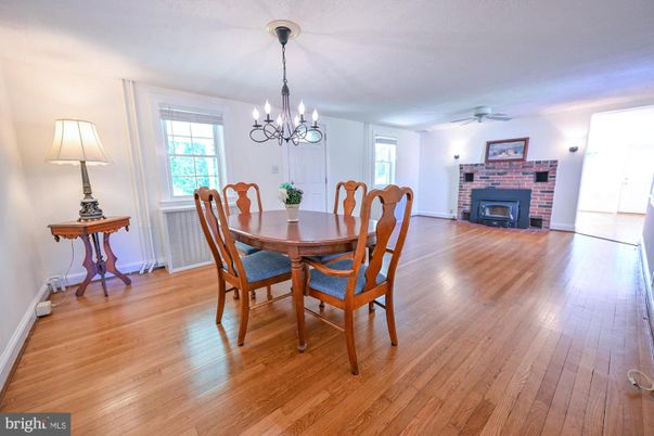 Chandelier, Dining room, Fireplace, Interior, Wood Texture Flooring