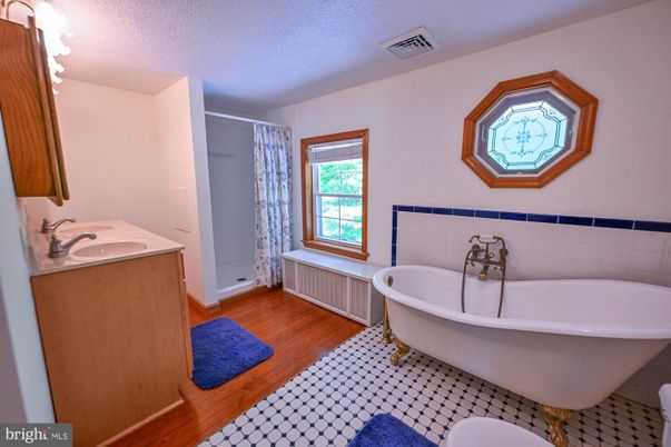 Bathroom, Dual Sink Vanities, Free Standing Baths, Interior, Wood Texture Flooring