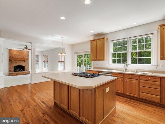 Chandelier, Fireplace, Interior, Kitchen, Pendant Lights, Recessed Lighting, Wood Texture Flooring