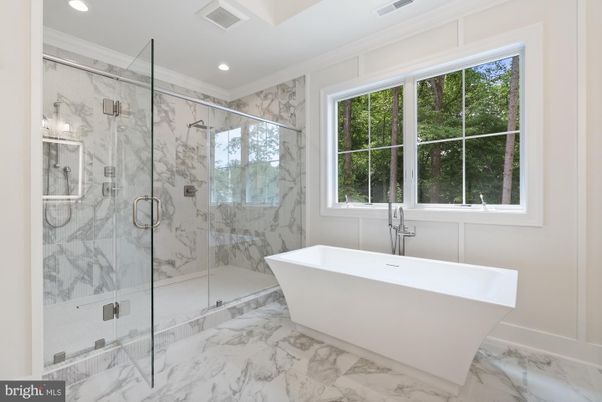 Bathroom, Free Standing Baths, Glass Shower, Interior, Marble, Marble Walls, Recessed Lighting