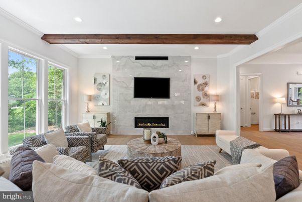 Fireplace, Interior, Living room, Marble Walls, Recessed Lighting, Wooden Beams, Wood Texture Flooring