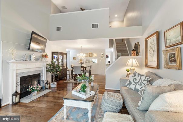 Chandelier, Dining room, Fireplace, Interior, Living room, Recessed Lighting, Wood Texture Flooring