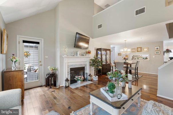 Chandelier, Dining room, Fireplace, Interior, Living room, Wood Texture Flooring