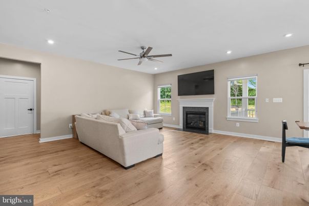Fireplace, Interior, Living room, Recessed Lighting, Wood Texture Flooring