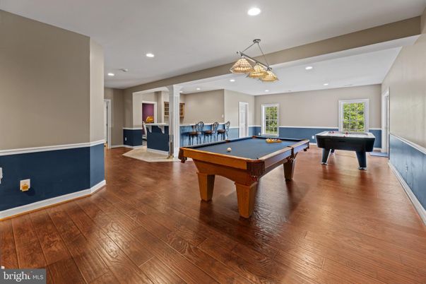 Billiard Table, Chandelier, Game Room, Interior, Pendant Lights, Recessed Lighting, Wood Texture Flooring