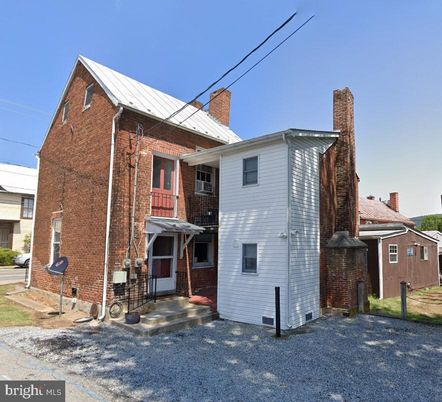 Exterior, Facade, Brick Facade, Cape Cod