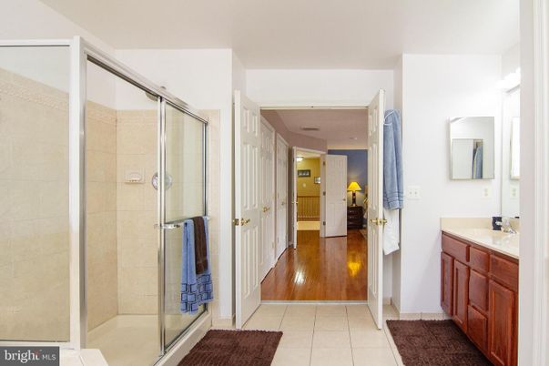 Bathroom, Glass Shower, Interior, Recessed Lighting, Wood Texture Flooring