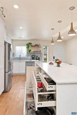Interior, Kitchen, Pendant Lights, Recessed Lighting, Stainless Steel Appliances, Wood Texture Flooring