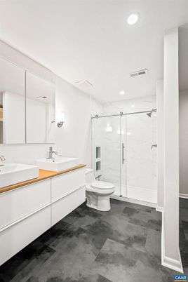 Bathroom, Dual Sink Vanities, Glass Shower, Interior, Marble Walls, Recessed Lighting