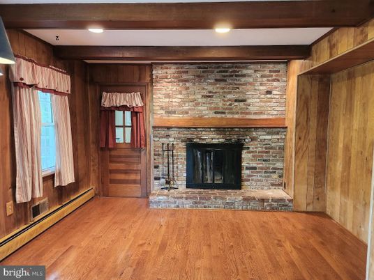 Empty room, Fireplace, Interior, Recessed Lighting, Stone Walls, Wood Texture Flooring, Wooden Walls