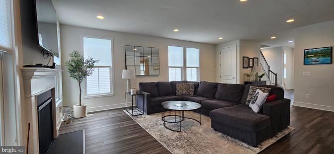 Fireplace, Interior, Living room, Recessed Lighting, Wood Texture Flooring