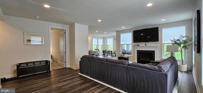 Dining room, Fireplace, Interior, Living room, Recessed Lighting, Wood Texture Flooring