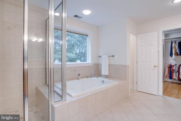 Bathroom, Glass Shower, Interior, Recessed Lighting, Walk-in Closets, Wood Texture Flooring