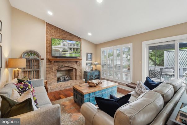 Fireplace, Interior, Living room, Recessed Lighting, Stone Walls, Wood Texture Flooring