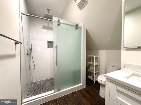 Bathroom, Glass Shower, Interior, Marble Walls, Wood Texture Flooring