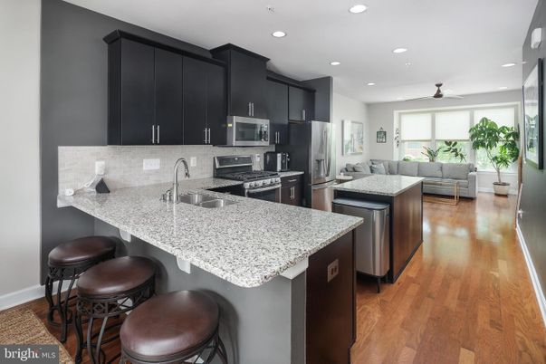 Interior, Kitchen, Living room, Recessed Lighting, Stainless Steel Appliances, Wood Texture Flooring
